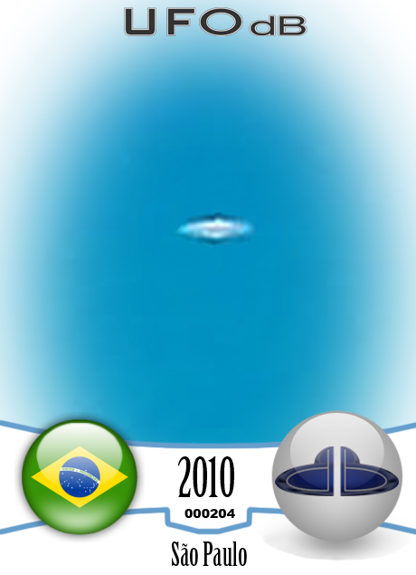 White UFO passing in cloudless turquoise sky over Sao Paulo Brazil UFO CARD Number 204