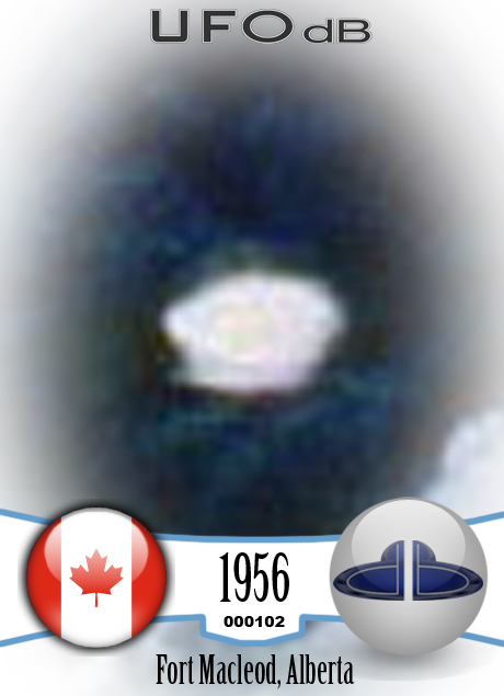 very bright disc-like object remaining stationary near a thunderhead UFO CARD Number 102
