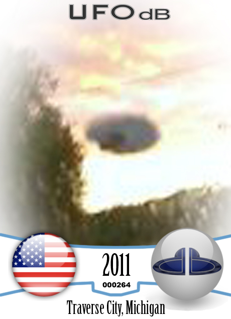 Car driver captures very fast UFO on picture | Michigan | April 8 2011 UFO CARD Number 264