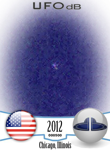 Coloful twinkling Star shaped UFO seen over Chicago, Illinois  2012 UFO CARD Number 500
