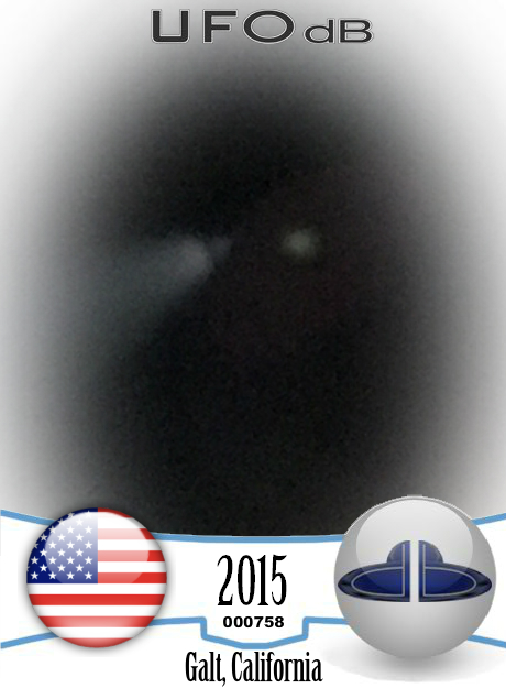 Coming out of my house saw UFO in the sky with a long beam of light -  UFO CARD Number 758