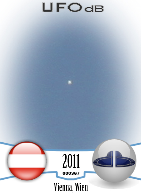 Couple on their balcony in Vienna sees a UFO and gets a picture - 2011 UFO CARD Number 367