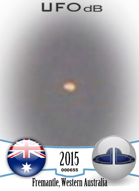 Day light large silver UFO in Fremantle Western Australia January 2015 UFO CARD Number 655