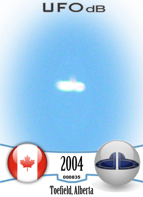 Donut UFO seen over the farm in Alberta Canada in 2004 UFO CARD Number 835