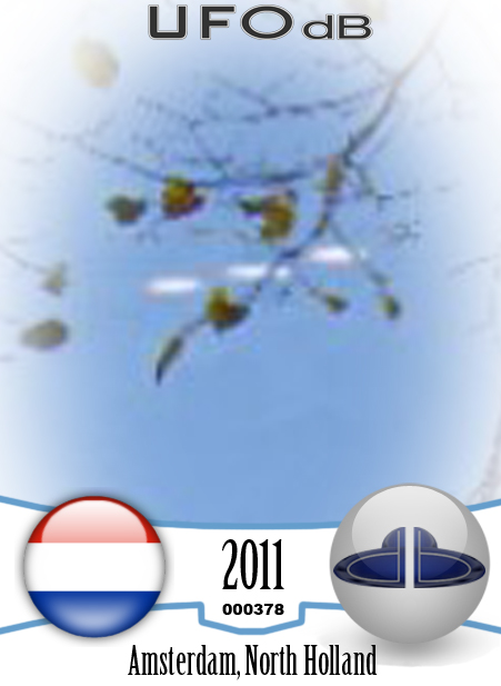 Fleet of 3 UFOs in formation caught on picture over Amsterdam in 2011 UFO CARD Number 378