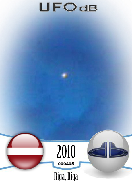 Fleet of 7 ufos changing color caught on photo over Riga, Latvia 2010 UFO CARD Number 405