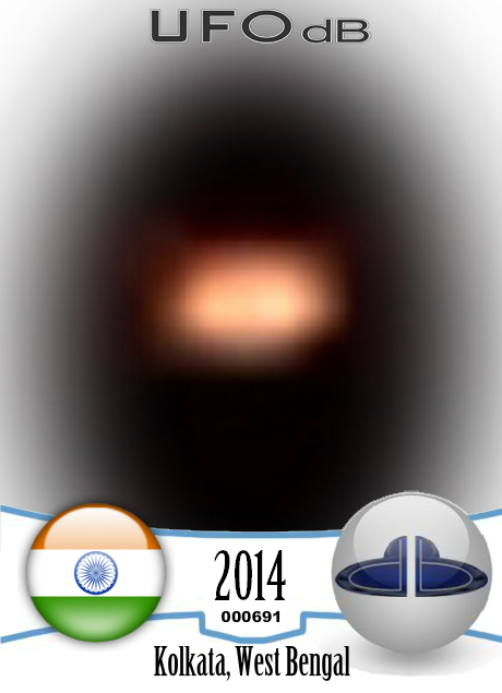 Glowing amber colored moving UFO - Kolkata, West Bengal India 2014 UFO CARD Number 691