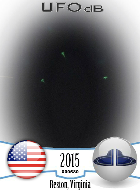 Green lights in formation, possibly emitted by circular objects UFO CARD Number 580
