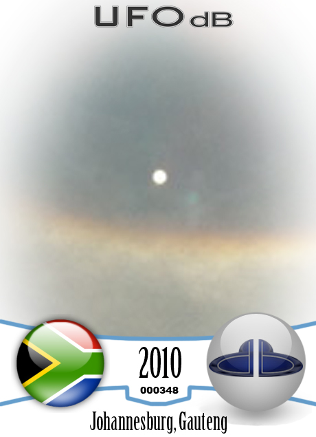 Huge halo around the sun with UFO moving near by in Johannesburg 2010 UFO CARD Number 348