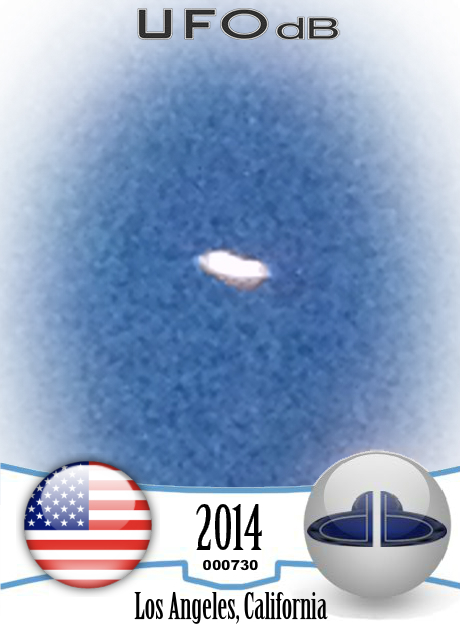Luminescent dome shaped UFO with red light at its base Los Angeles USA UFO CARD Number 730
