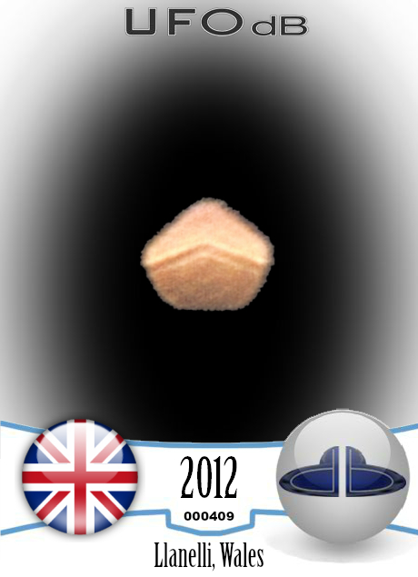 Orange UFO with strange shape zig zagging in the sky - Wales, UK 2012 UFO CARD Number 409