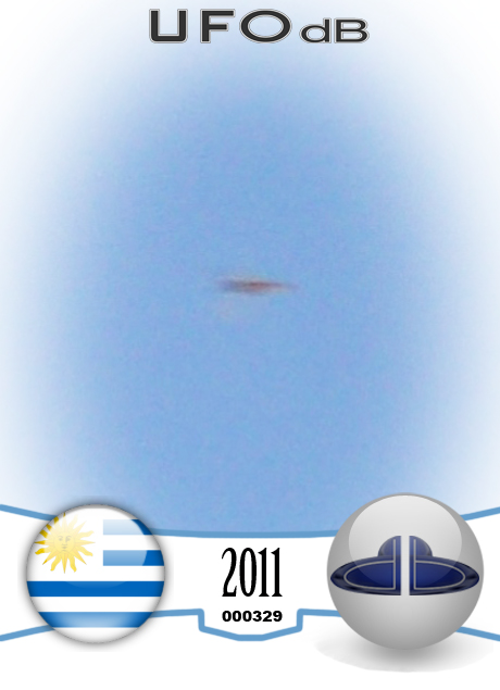 Photo Contest shot capture a passing UFO in Uruguay | May 18 2011 UFO CARD Number 329