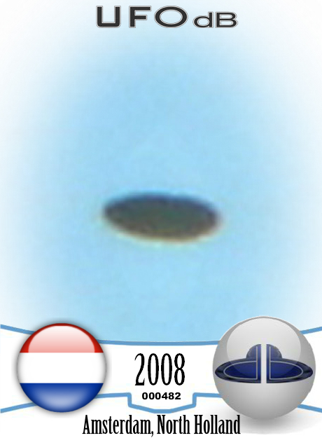 Picture from canal boat captures UFO passing over Amsterdam in 2008 UFO CARD Number 482