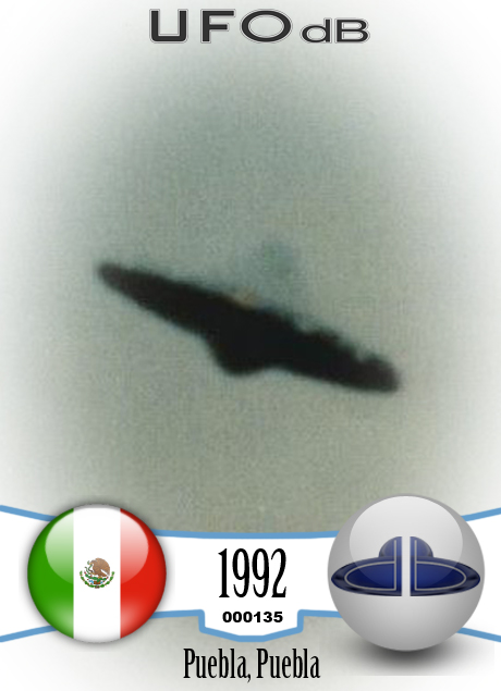 We can see clearly on the edge of the saucer, small gleaming lights UFO CARD Number 135