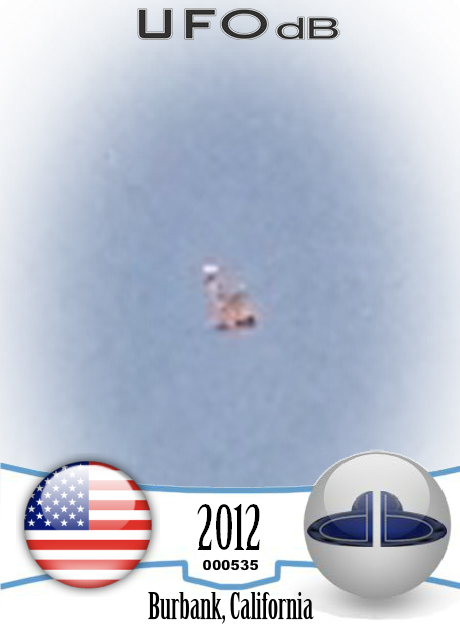 Silent UFO with copper colored panels in Burbank California Photo 2012 UFO CARD Number 535