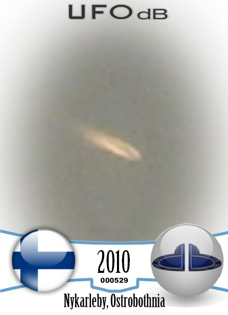 Slow Lonely cloud in clear sky is a UFO in Ostrobothnia Finland 2010 UFO CARD Number 529