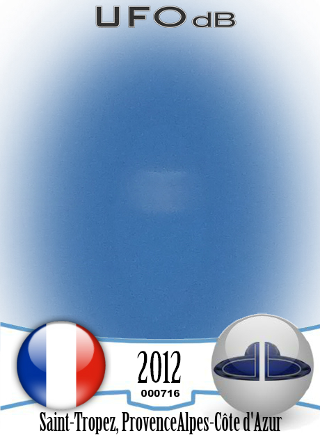 Took a picture and saw the UFO later on picture St-Tropez France 2012 UFO CARD Number 716