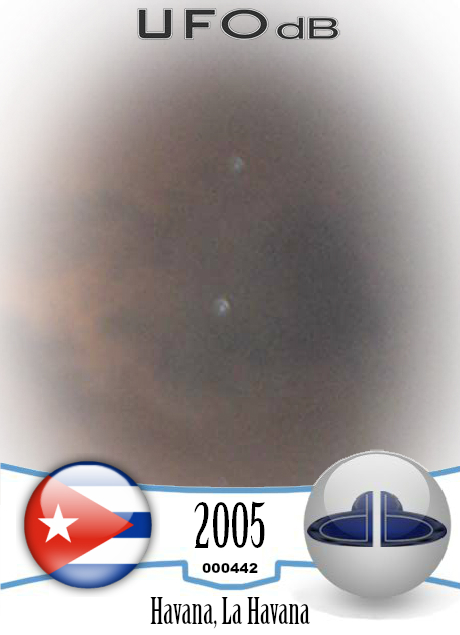Triangular UFO formation caught on picture in Havana, Cuba in 2005 UFO CARD Number 442