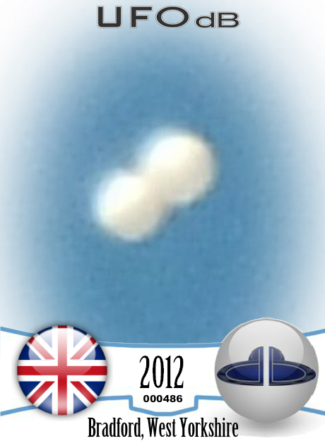 Twin sphere UFO caught on picture over Bradford west Yorkshire UK 2012 UFO CARD Number 486