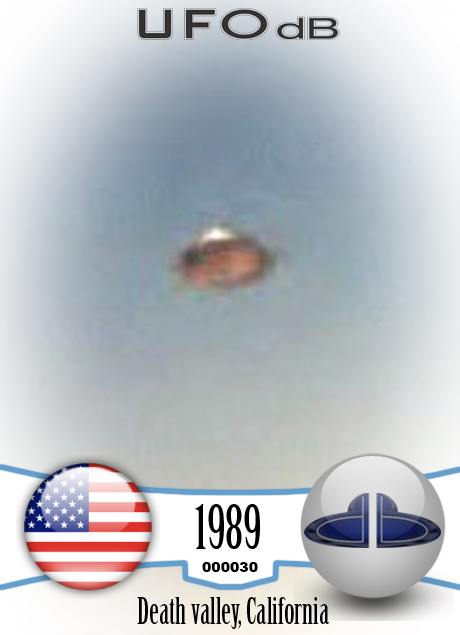 UFO Picture caught in bright day light over desertic mountains UFO CARD Number 30