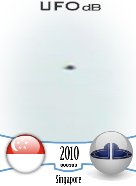 UFO caught on picture near the Resort World Sentosa in Singapore 2010 UFO CARD Number 393