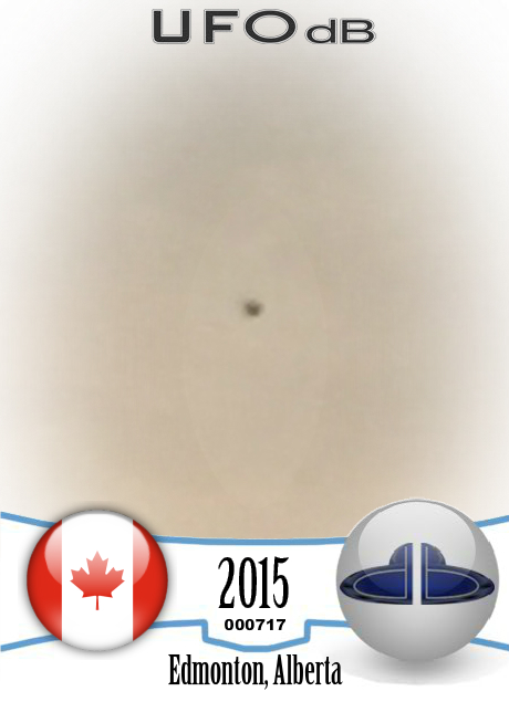 UFO on the 2nd of 3 consecutive photos - Edmonton Alberta Canada 2015 UFO CARD Number 717