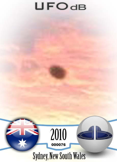 The UFO came out from a light in the cloudy sky during sunset UFO CARD Number 76