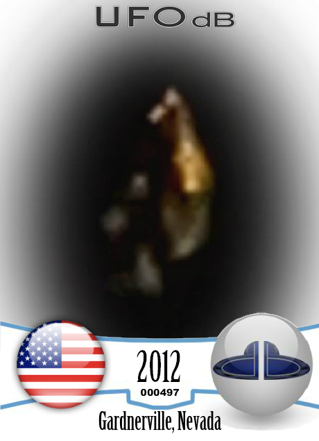 UFO similar to huge gold nugget caught on picture over Nevada USA 2012 UFO CARD Number 497