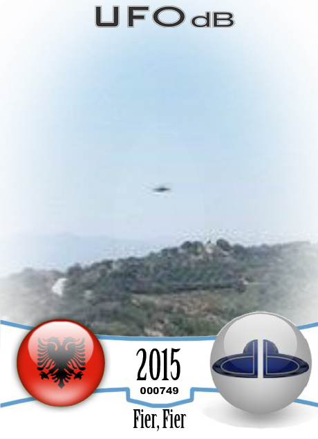 Watching photo at once I recognize the UFO hovering - Fier Albania UFO CARD Number 749