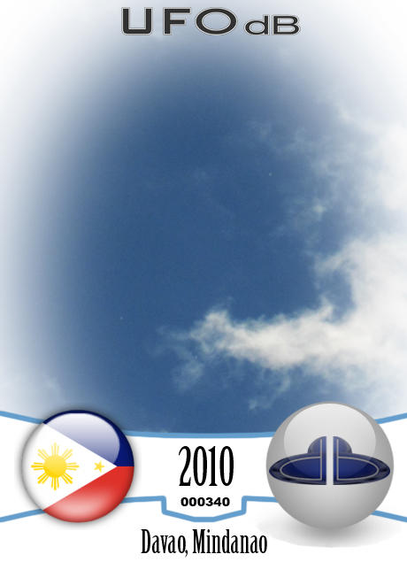 White disc UFOs hides behind clouds Davao Philippines November 3 2010 UFO CARD Number 340
