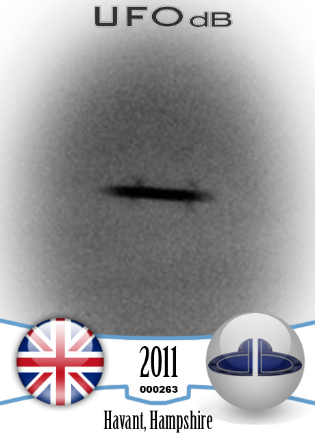 Dark Winged Saucer UFO over the town of Havant, England | April 7 2011 UFO CARD Number 263