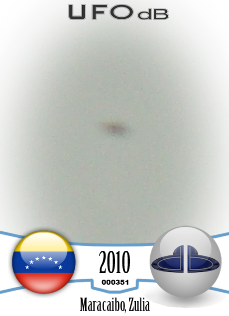 Witness near Maracaibo Airport takes a picture of a UFO near Airplane UFO CARD Number 351