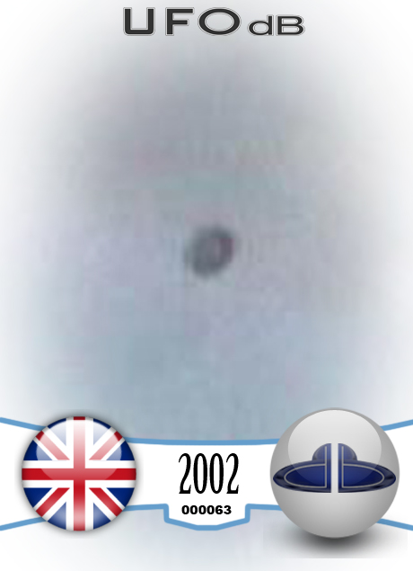 UFO Pictures UFOdB.com - UFO near airplane in England in 2002 UFO CARD Number 63