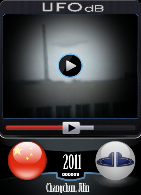 Black shadow UFO moving slowly over stadium in Changchun in China 2011 UFO CARD Number 9