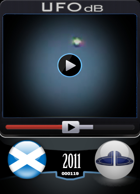 Colorful Flashing UFO caught on video somewhere over Scotland in 2011 UFO CARD Number 119