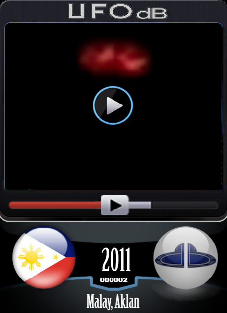 Extra-terrestrial UFO pulsating colors over water in Philippines 2011 UFO CARD Number 2