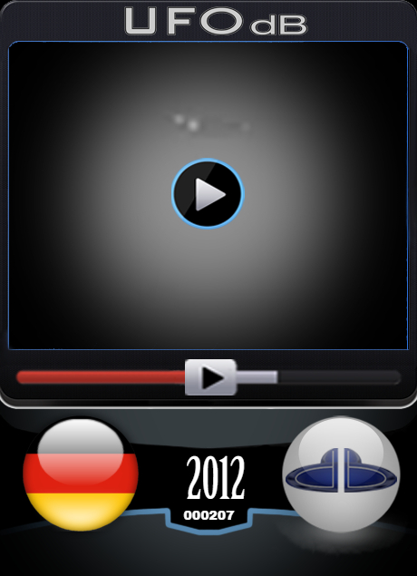 Pair of saucer UFOs caught on video somewhere in Germany - 2012 UFO CARD Number 207