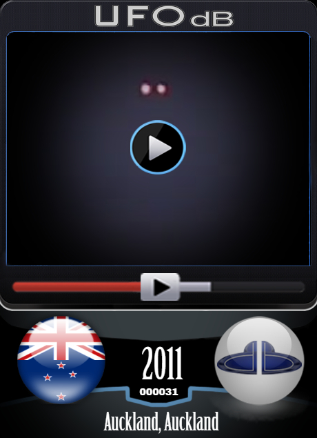 Twin redish lights UFO hovering slowly over Auckland, New Zealand 2011 UFO CARD Number 31