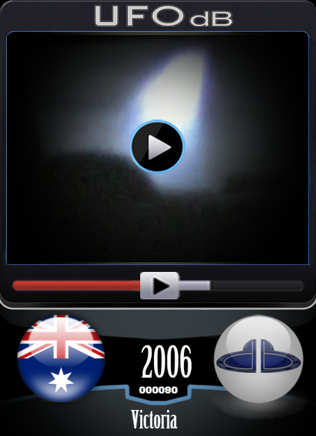 UFO video showing beam of light next to moving car in Australia - 2006 UFO CARD Number 90